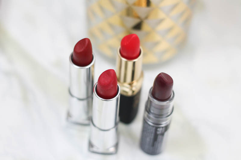 Miami beauty blogger Stephanie Pernas reviews the 4 best drugstore red lipsticks