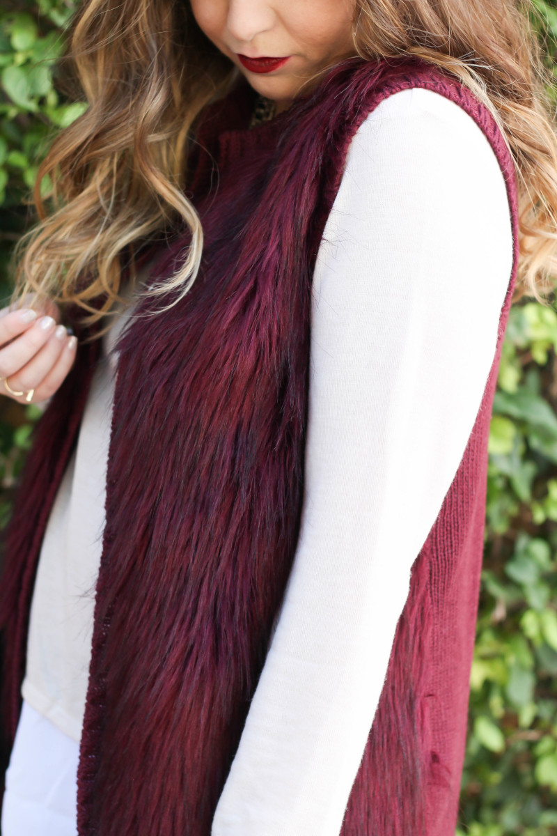 fur vest, layered sweater, leather leggings-10