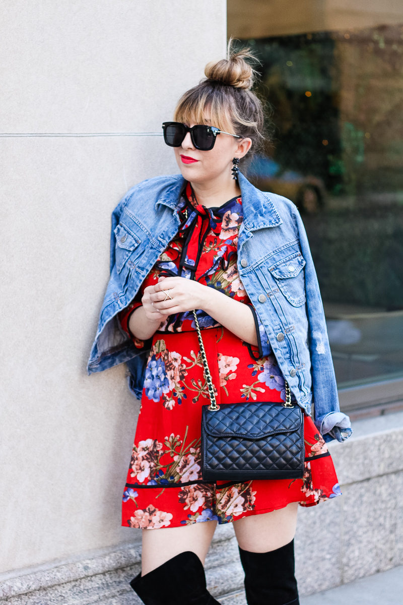 Miami fashion blogger Stephanie Pernas styles a jean jacket draped over a bow tie dress