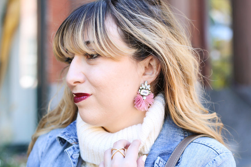 Miami fashion blogger Stephanie Pernas wearing Baublebar Flamenco Drops earrings with a cozy turtleneck sweater.