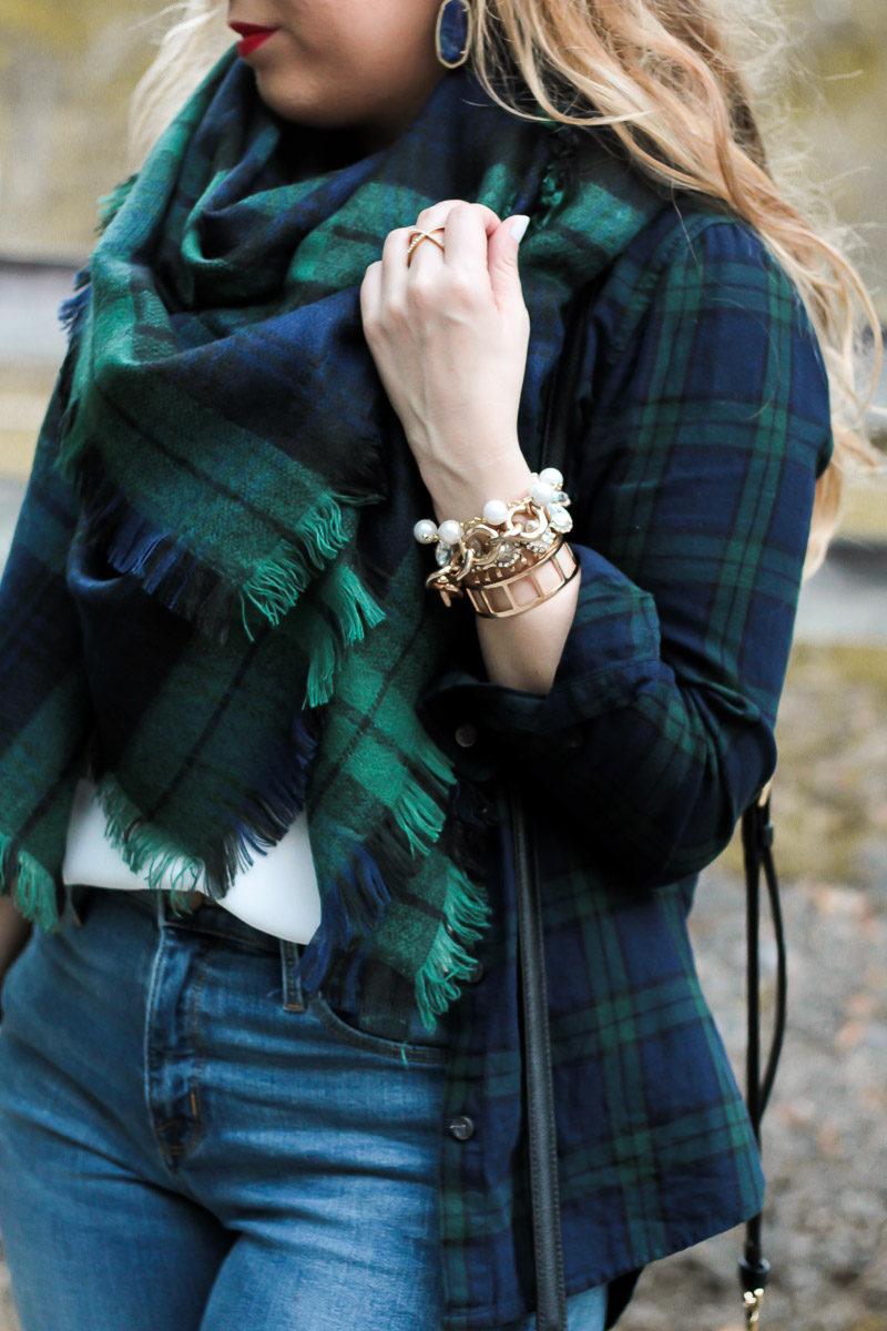 Fashion blogger Stephanie Pernas of A Sparkle Factor styles a chic bracelet stack with mixed watch plaids for a cute casual holiday outfit idea