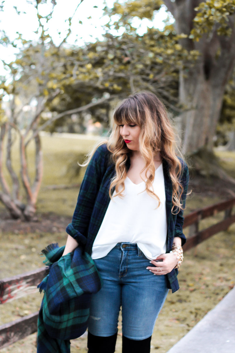 Miami fashion blogger Stephanie Pernas styles a plaid blanket scarf and Sole Society over the knee boots for a casual holiday plaid shirt outfit 