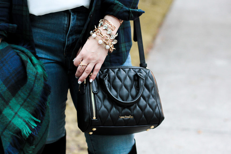 Miami fashion blogger Stephanie Pernas styling a chic bracelet stack and blanket scarf