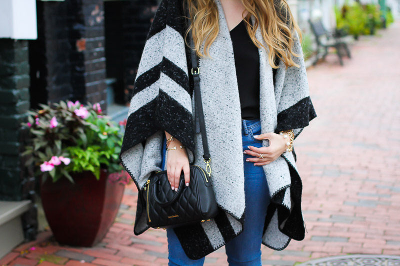 Miami fashion blogger Stephanie Pernas shares a fall poncho outfit idea