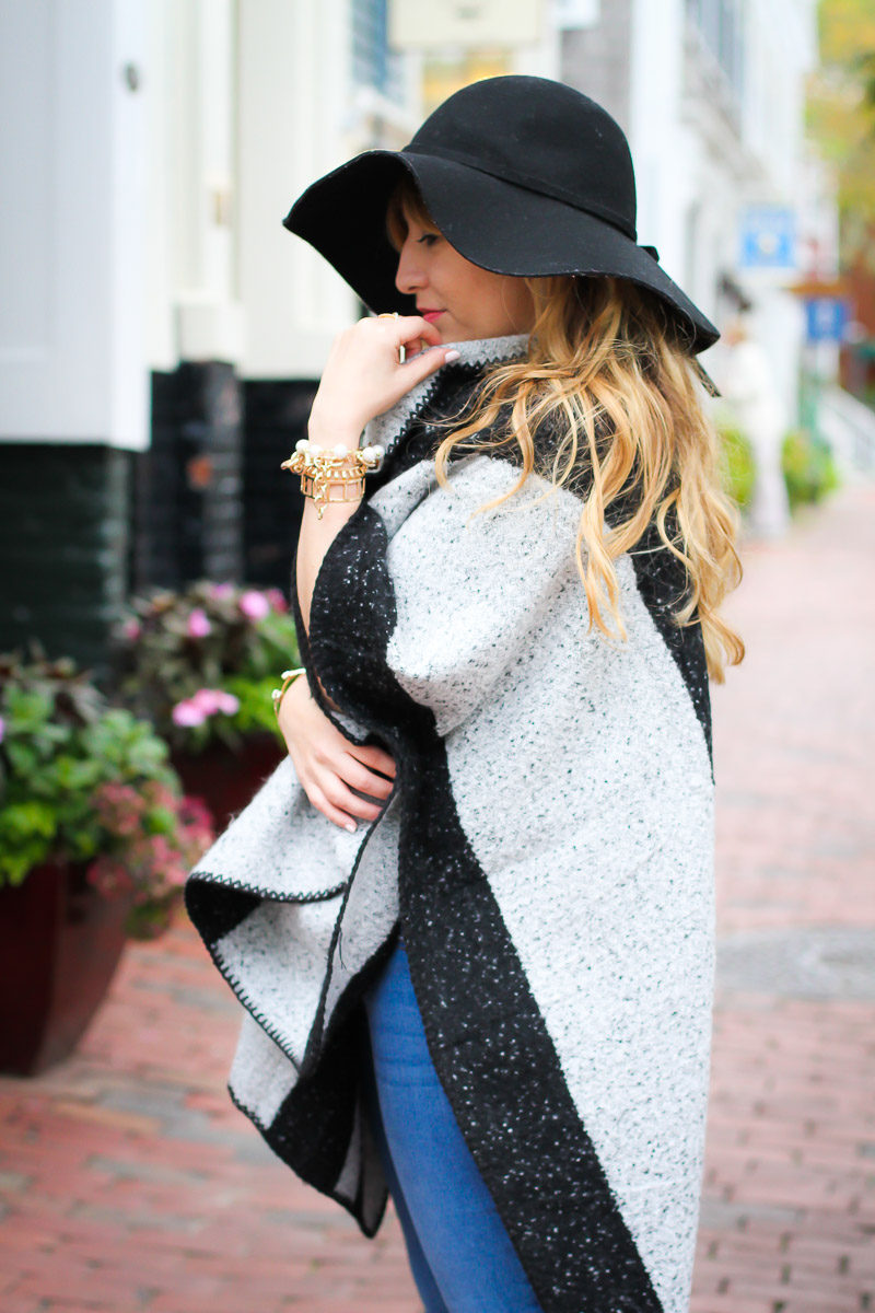 Miami fashion blogger Stephanie Pernas cozies up in Nantucket with a stripe cape from ILY Couture