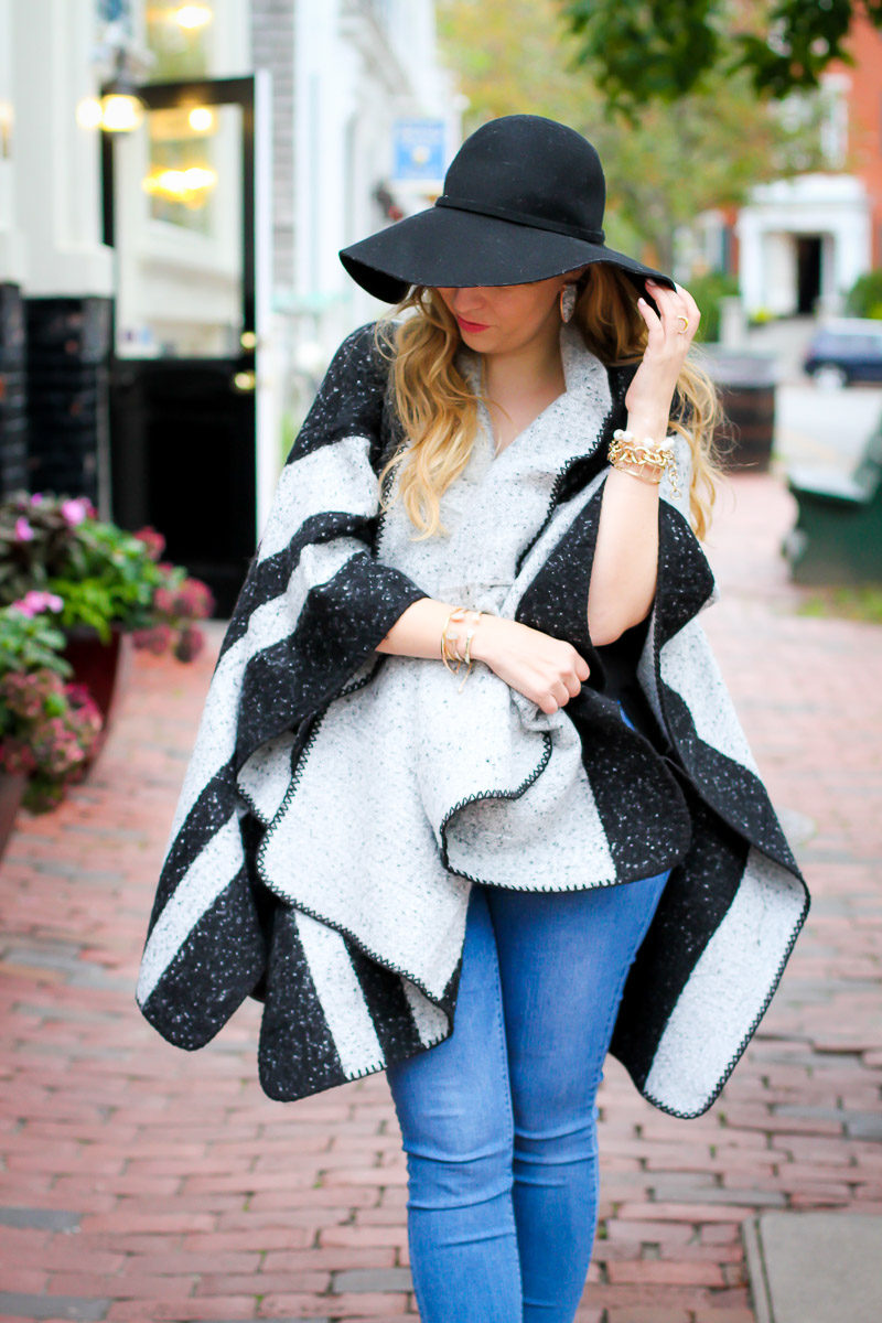 Miami fashion blogger Stephanie Pernas wearing a cozy cape for fall in Nantucket