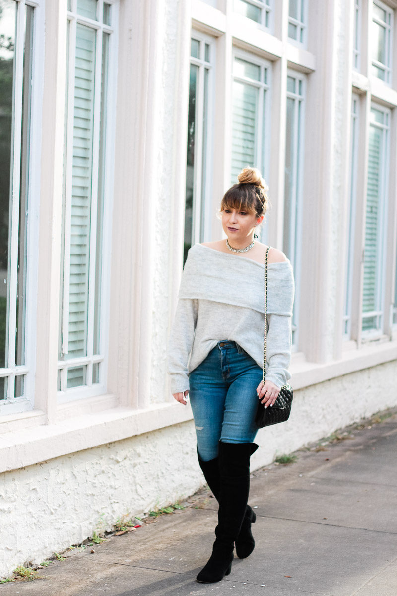 Miami fashion blogger Stephanie Pernas of A Sparkle Factor wearing a sweater, jeans and boots