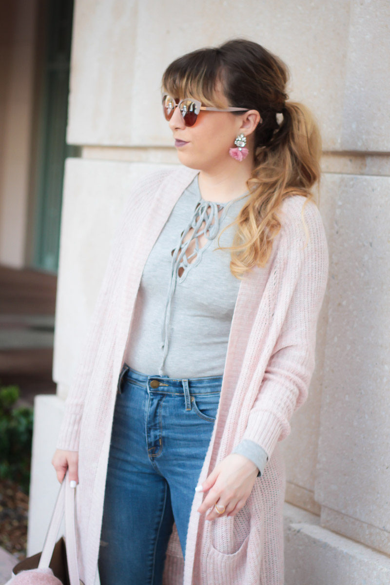 Miami fashion blogger Stephanie Pernas of A Sparkle Factor styles a casual fall outfit with lace up tee and boyfriend cardigan 