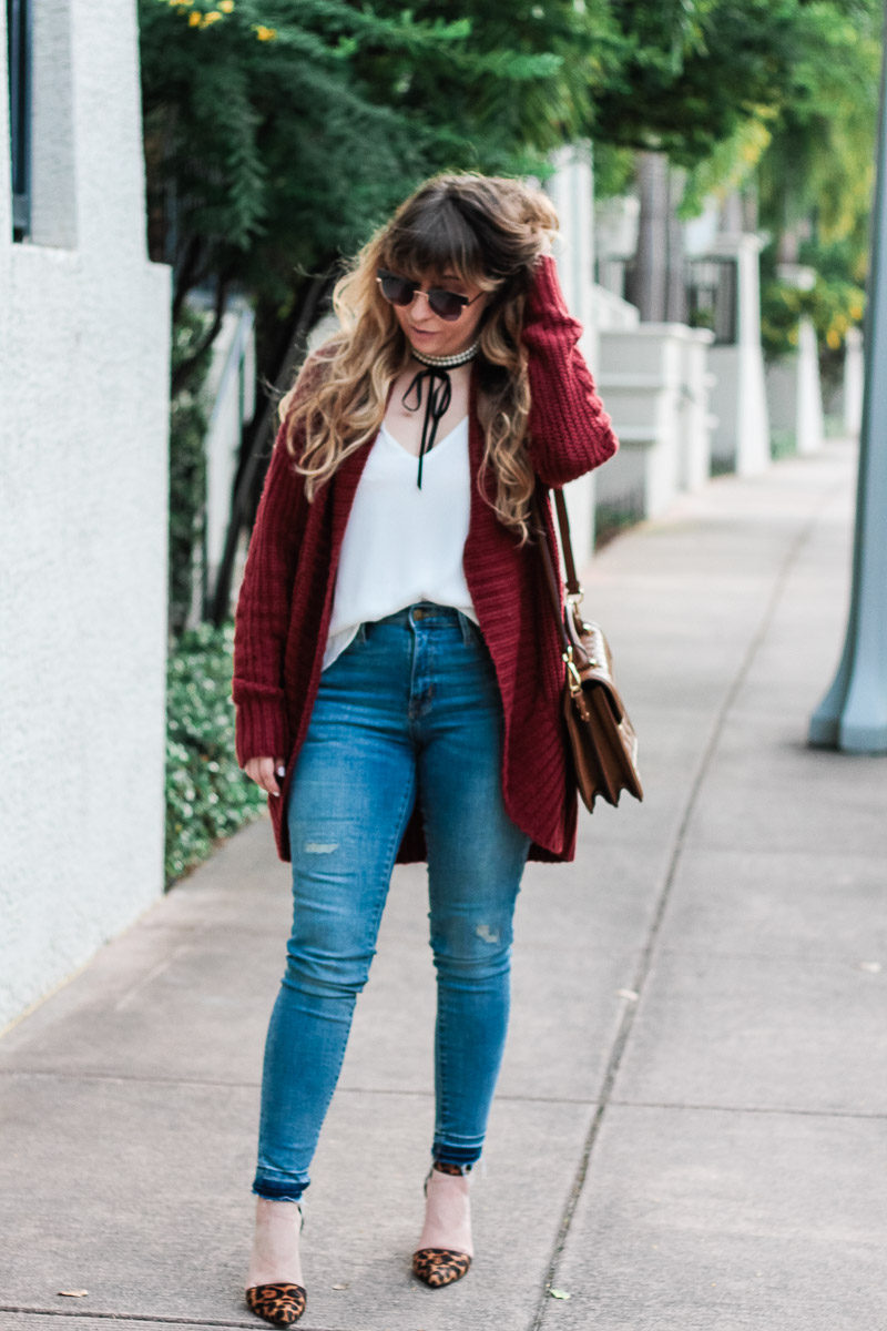 Miami fashion blogger Stephanie Pernas wearing a cable knit cardigan and leopard pumps 