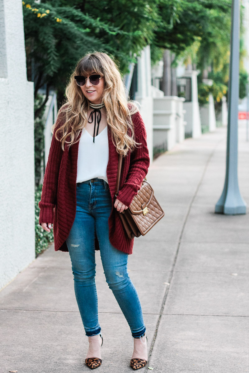 Fashion blogger wearing jeans with a boyfriend cardigan