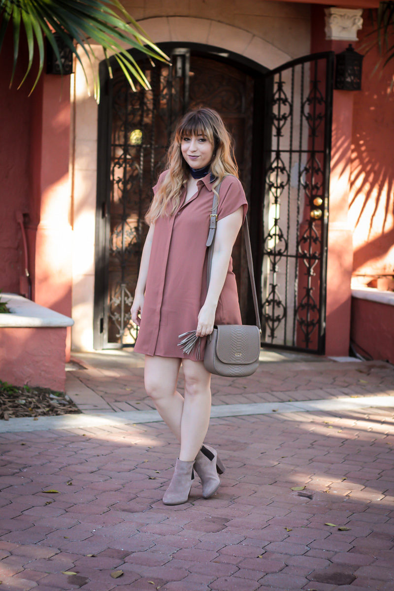 Miami fashion blogger Stephanie Pernas wearing a sleeveless shirtdress and booties with a bandana neckscarf