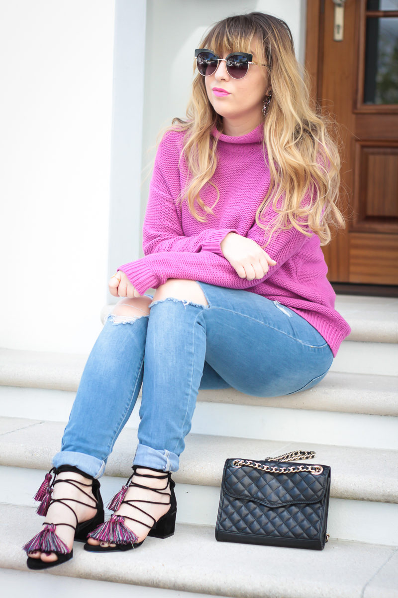 Miami fashion blogger Stephanie Pernas wearing ripped jeans with Rebecca Minkoff tassel sandals