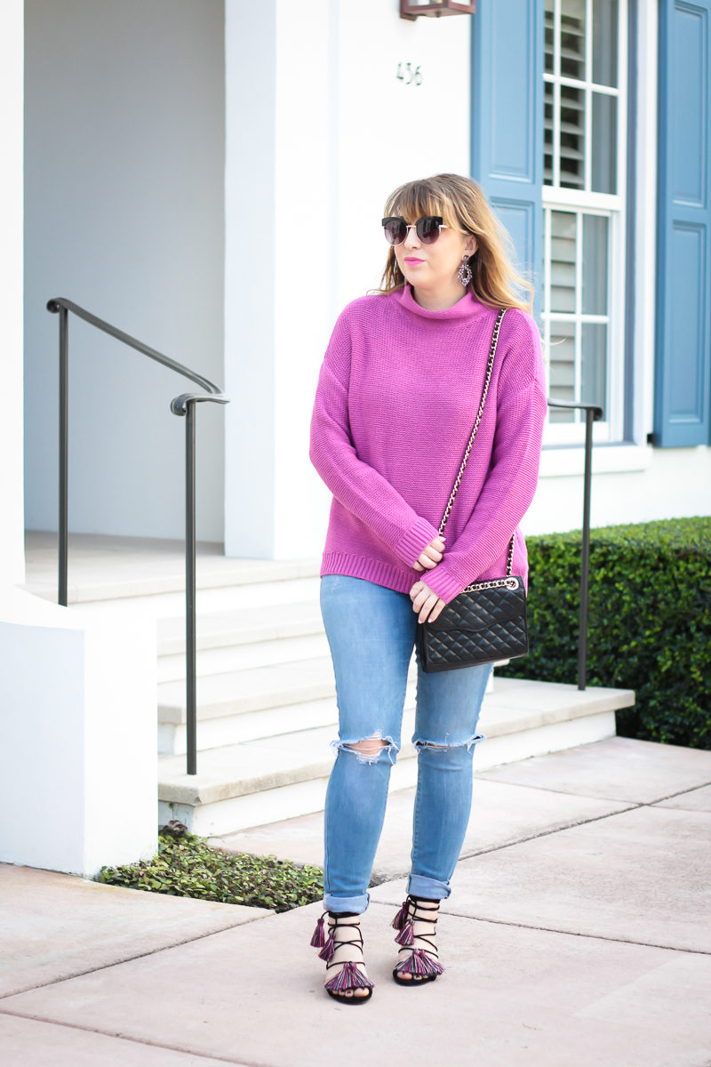 Miami fashion blogger Stephanie Pernas wearing a fuschia sweater and ripped jeans for an effortless everyday outfit