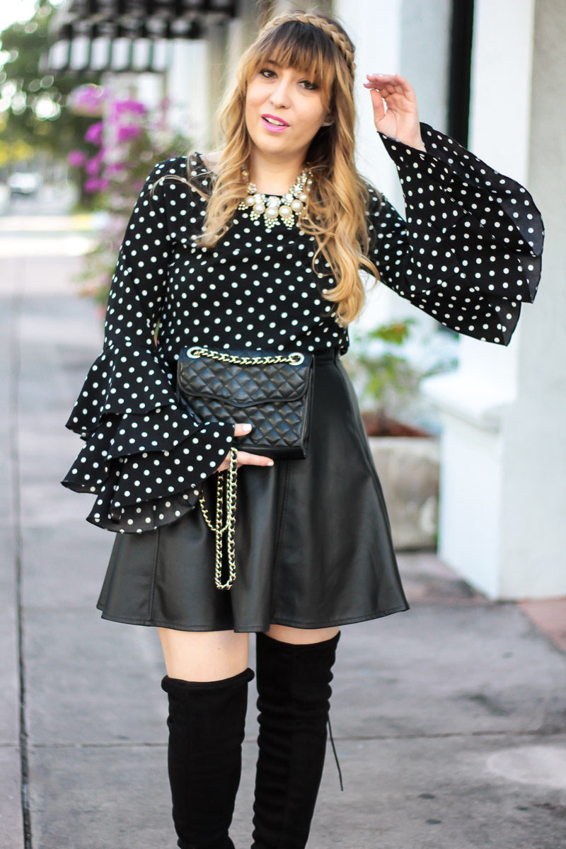 Miami fashion blogger Stephanie Pernas wearing a statement sleeve blouse and layered necklaces