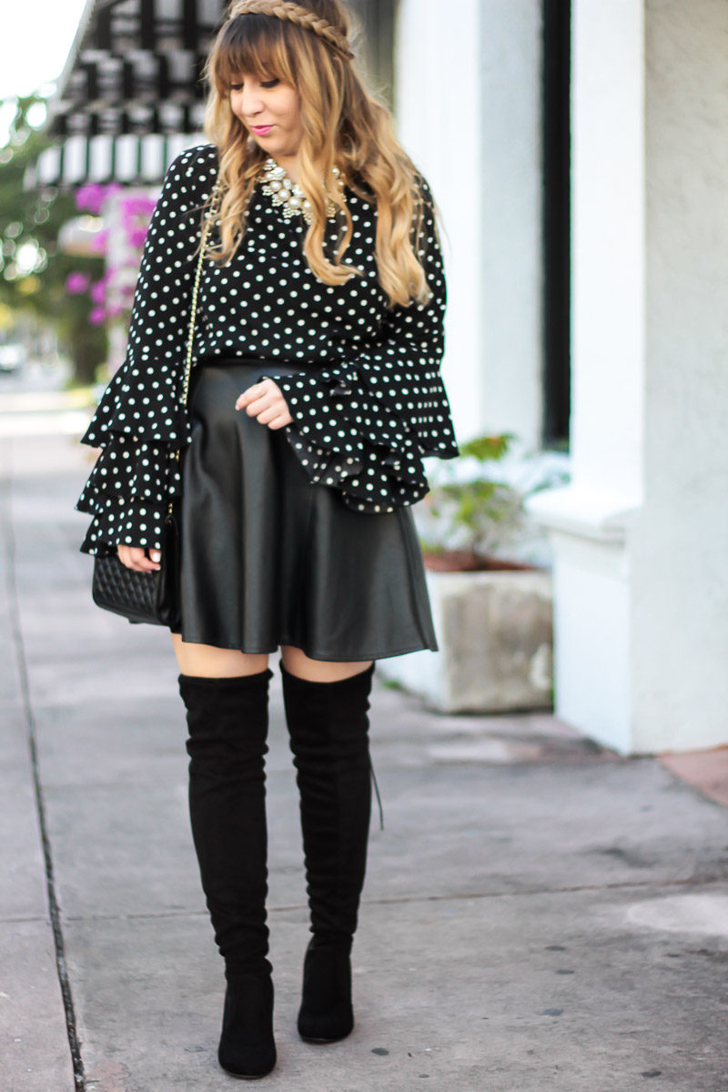 Miami fashion blogger Stephanie Pernas wearing a polka dot ruffle sleeve top and leather skirt