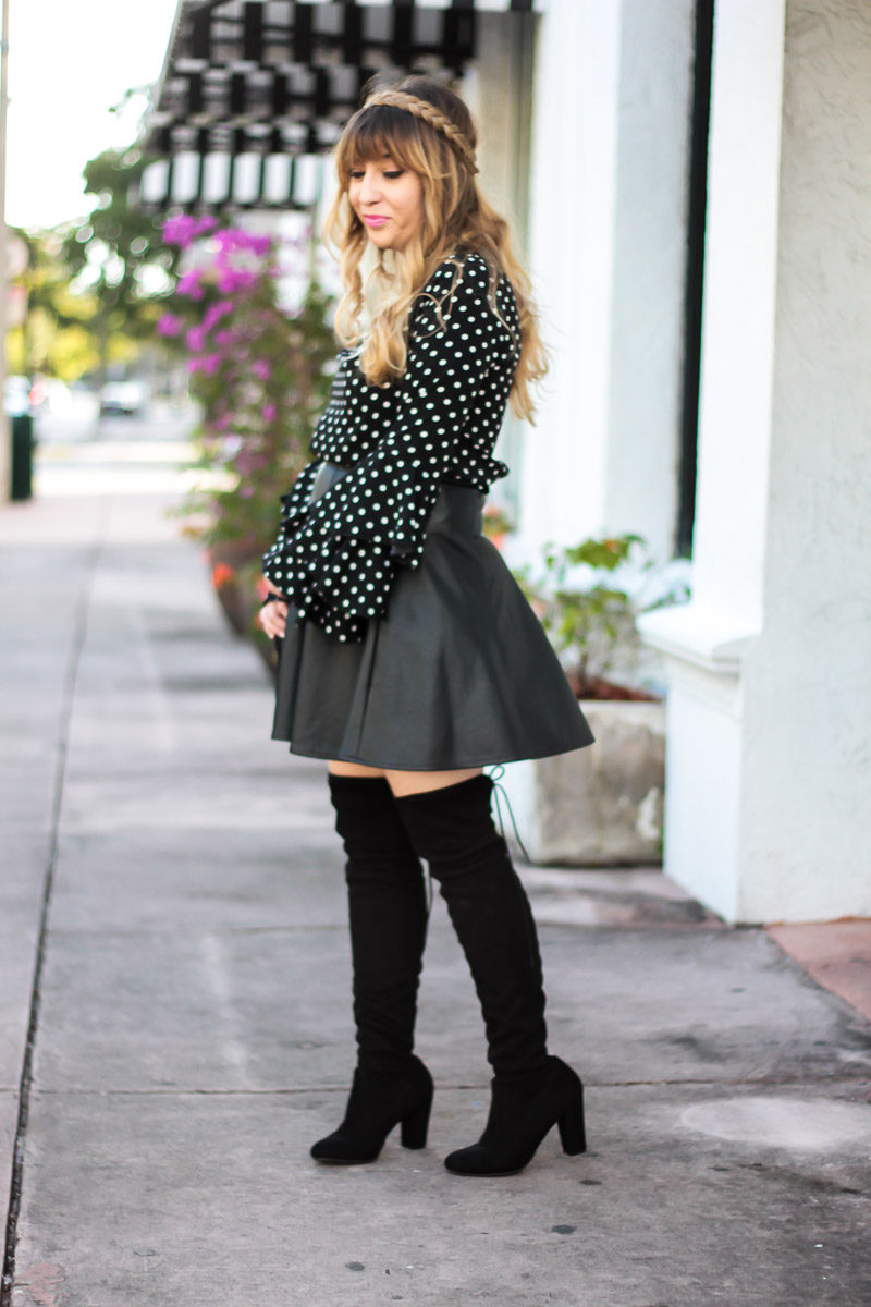 Miami fashion blogger Stephanie Pernas wearing a chic leather skirt with polka dot top