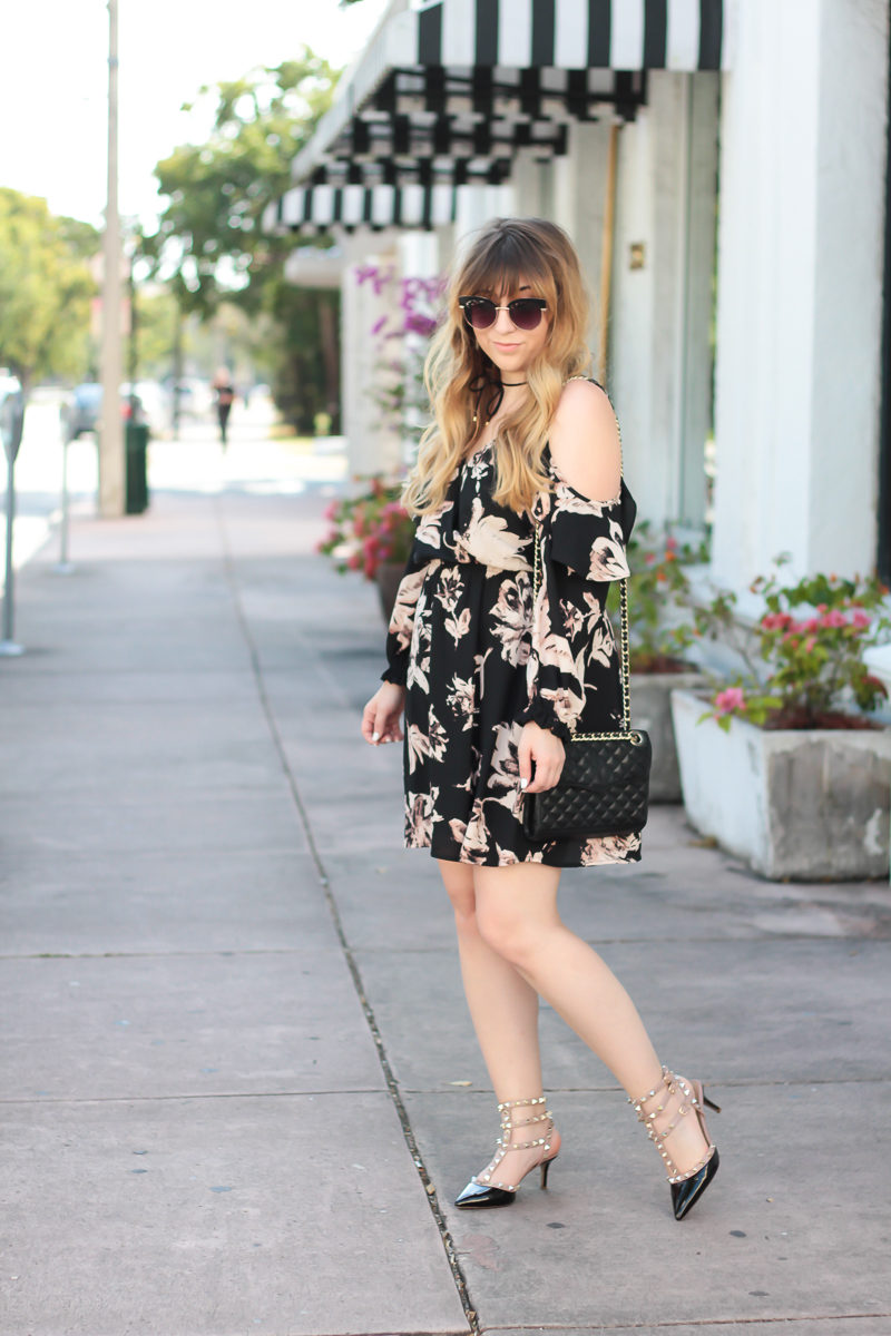  Miami fashion blogger Stephanie Pernas styles an Aqua floral cold shoulder dress