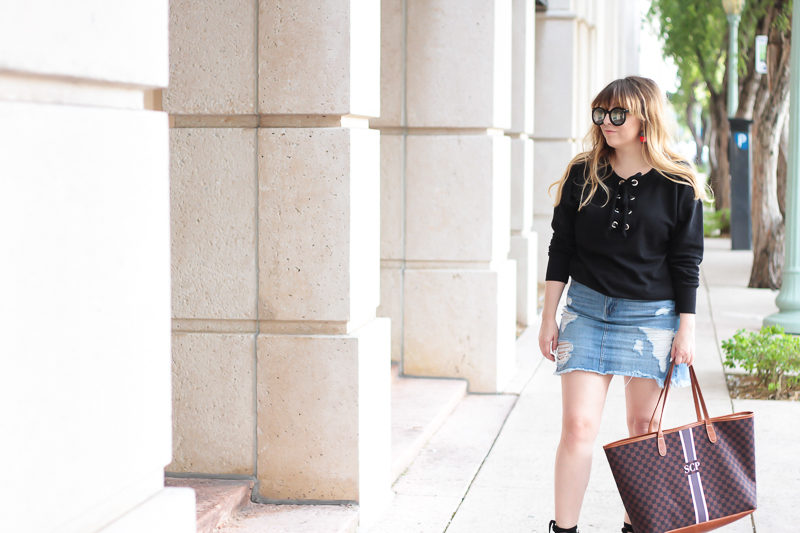 Miami fashion blogger Stephanie Pernas of A Sparkle Factor wearing a lace up sweater outfit 