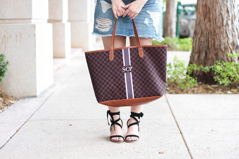 Miami fashion blogger Stephanie Pernas of A Sparkle Factor styling the Barrington Gifts St Anne monogram tote with a jean skirt and lace up heels