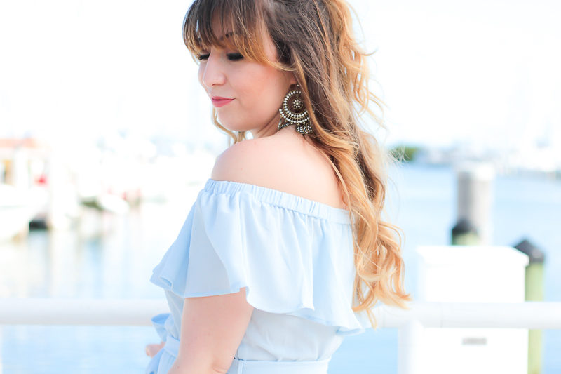 Miami fashion blogger Stephanie Pernas wearing Charming Charlie earrings