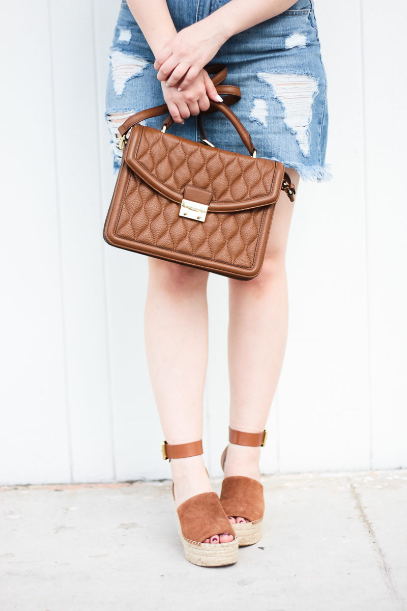 Miami fashion blogger Stephanie Pernas styles Marc Fisher Adalyn wedges with a jean skirt for a casual spring outfit