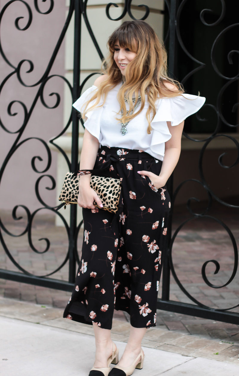 Miami fashion blogger Stephanie Pernas styles a flutter sleeve top with culottes for a fashion forward spring outfit idea