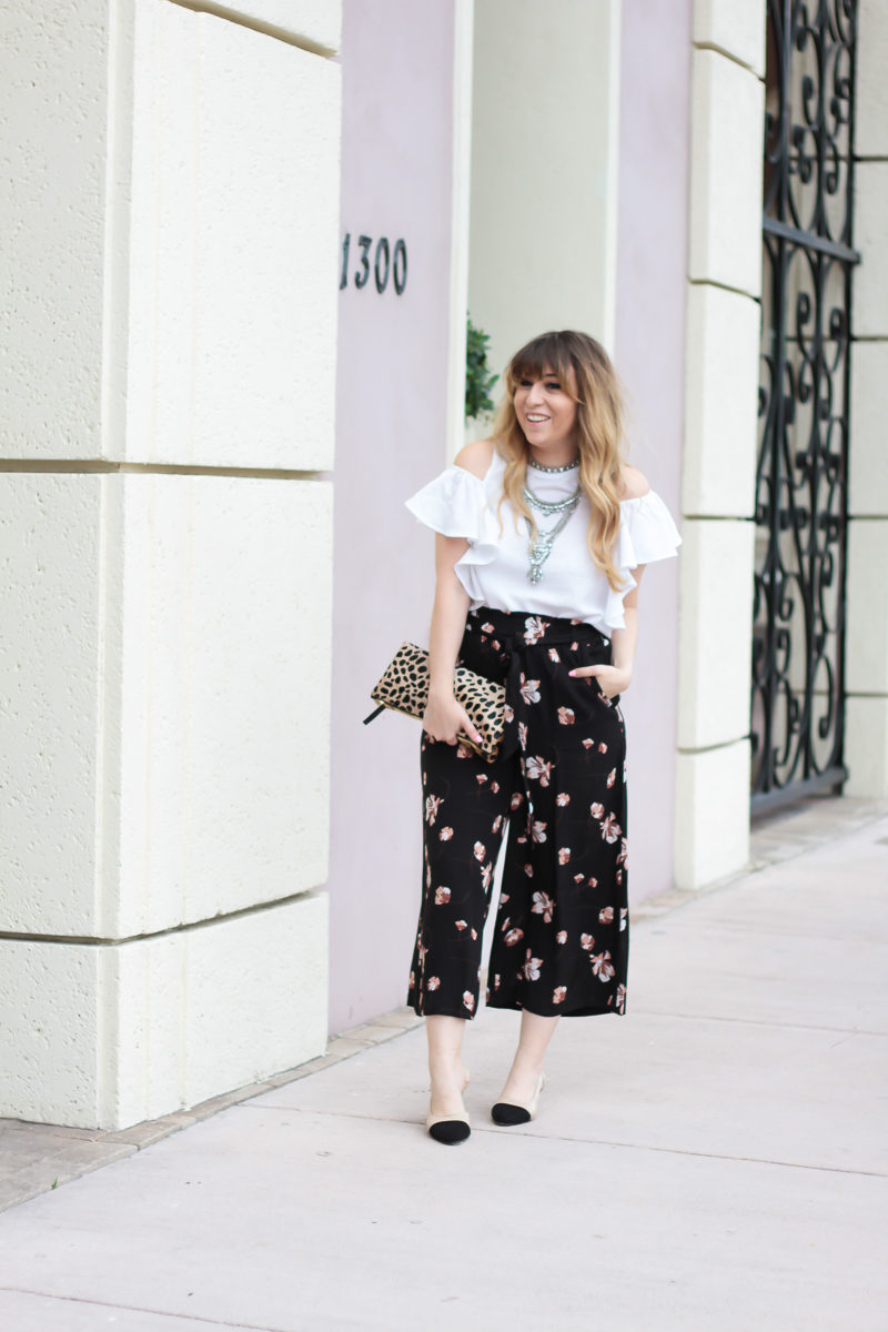 Miami fashion blogger Stephanie Pernas wearing palazzo pants and a cold shoulder top