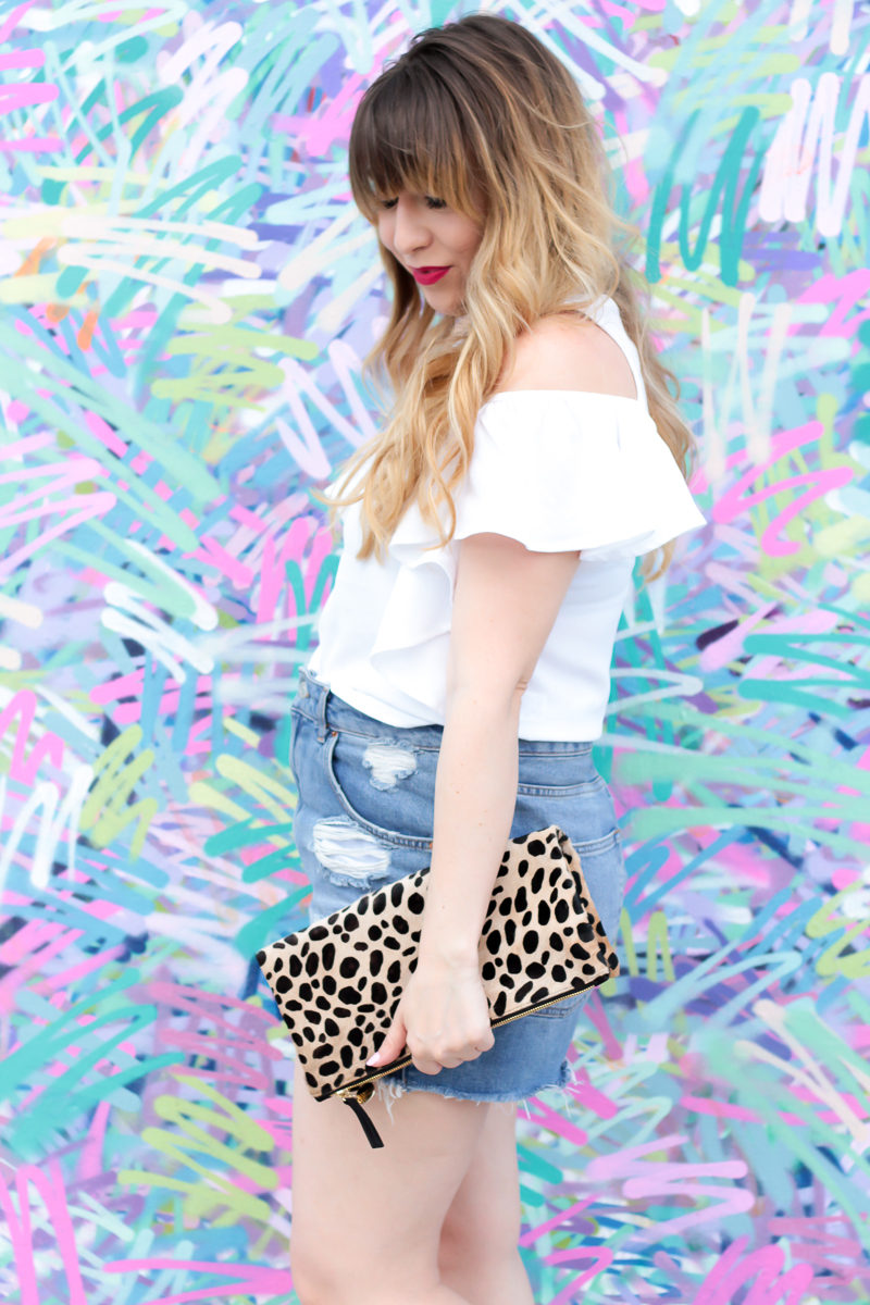 Miami fashion blogger Stephanie Pernas styles a casual spring jean shorts outfit idea