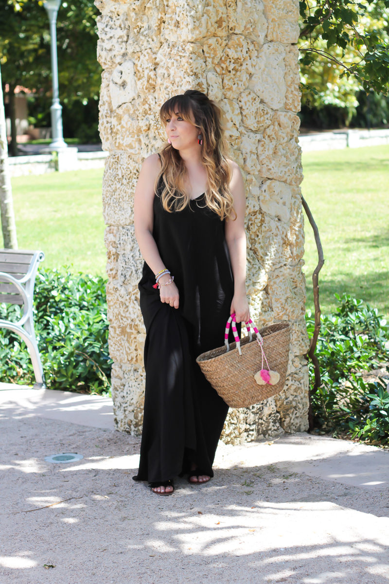 Miami fashion blogger Stephanie Pernas styles a black maxi dress for a comfortable and chic spring and summer outfit idea 