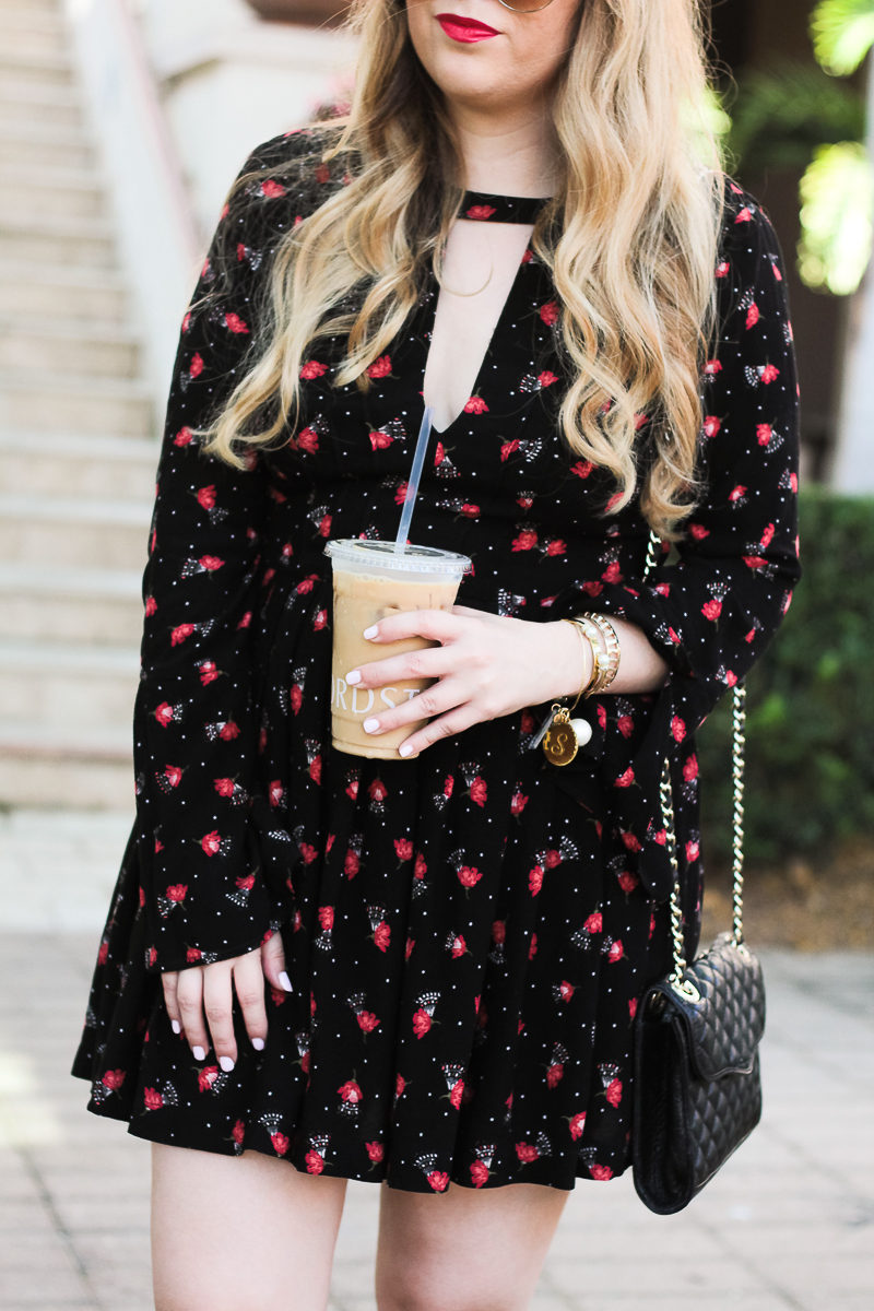 Miami fashion blogger Stephanie Pernas wearing a black floral Free People Tegan dress 