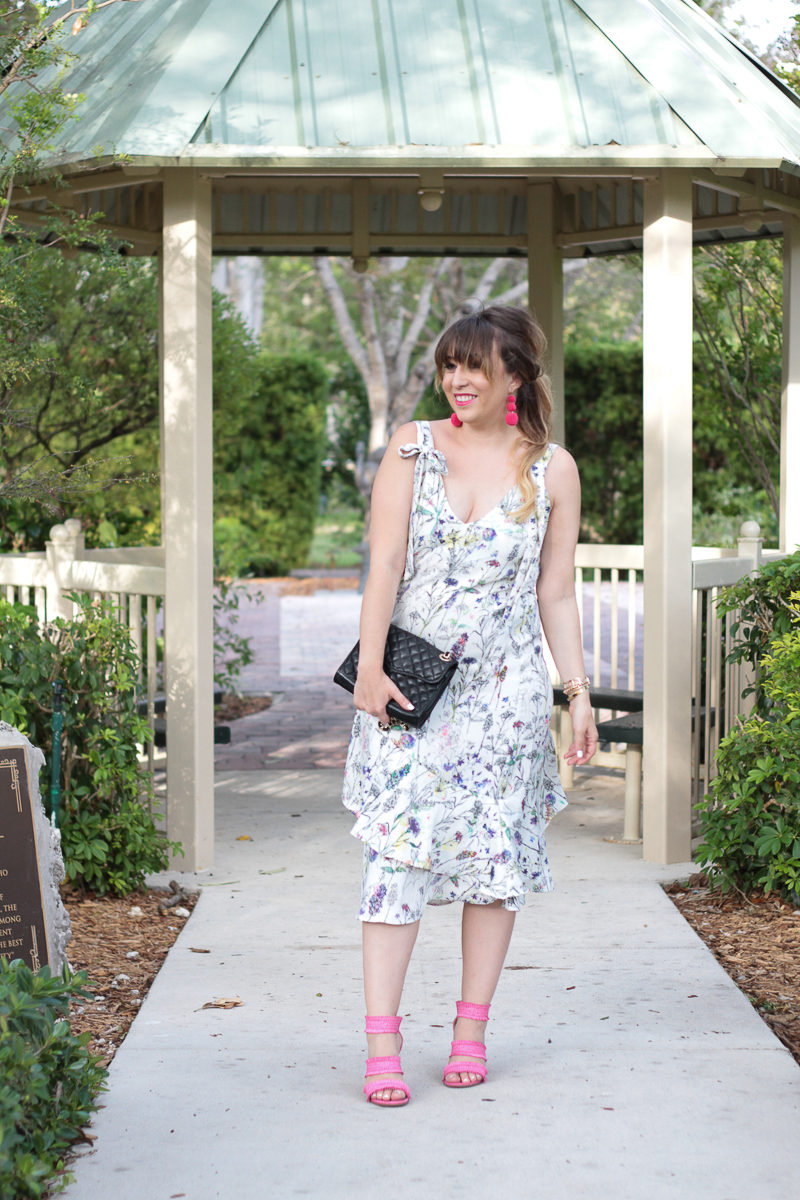 Miami fashion blogger Stephanie Pernas wearing a floral midi dress for spring