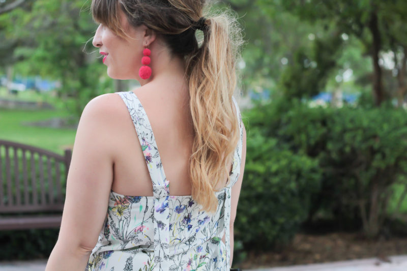 Miami fashion blogger Stephanie Pernas styles a bow shoulder midi dress with Baublebar pom pom earrings 