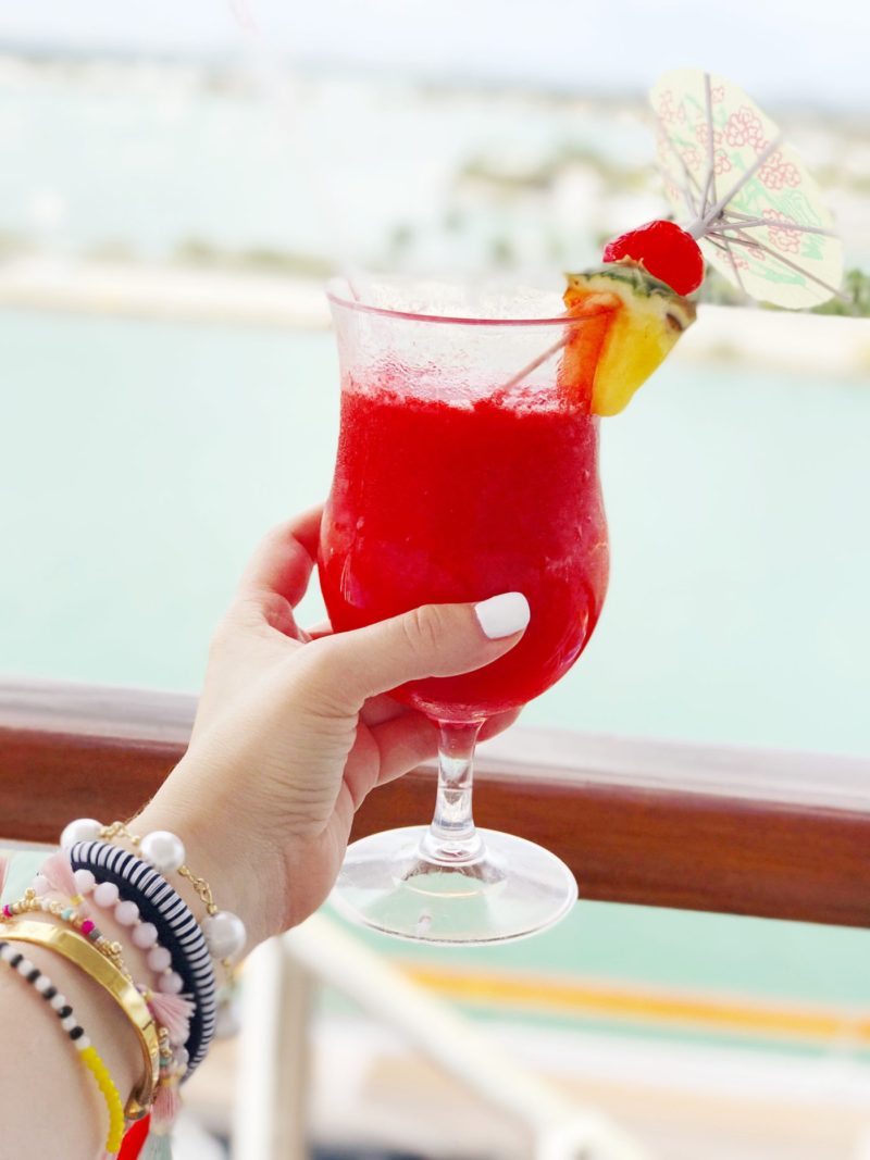 Miami fashion blogger Stephanie Pernas sips a strawberry daiquri on the Carnival Victory