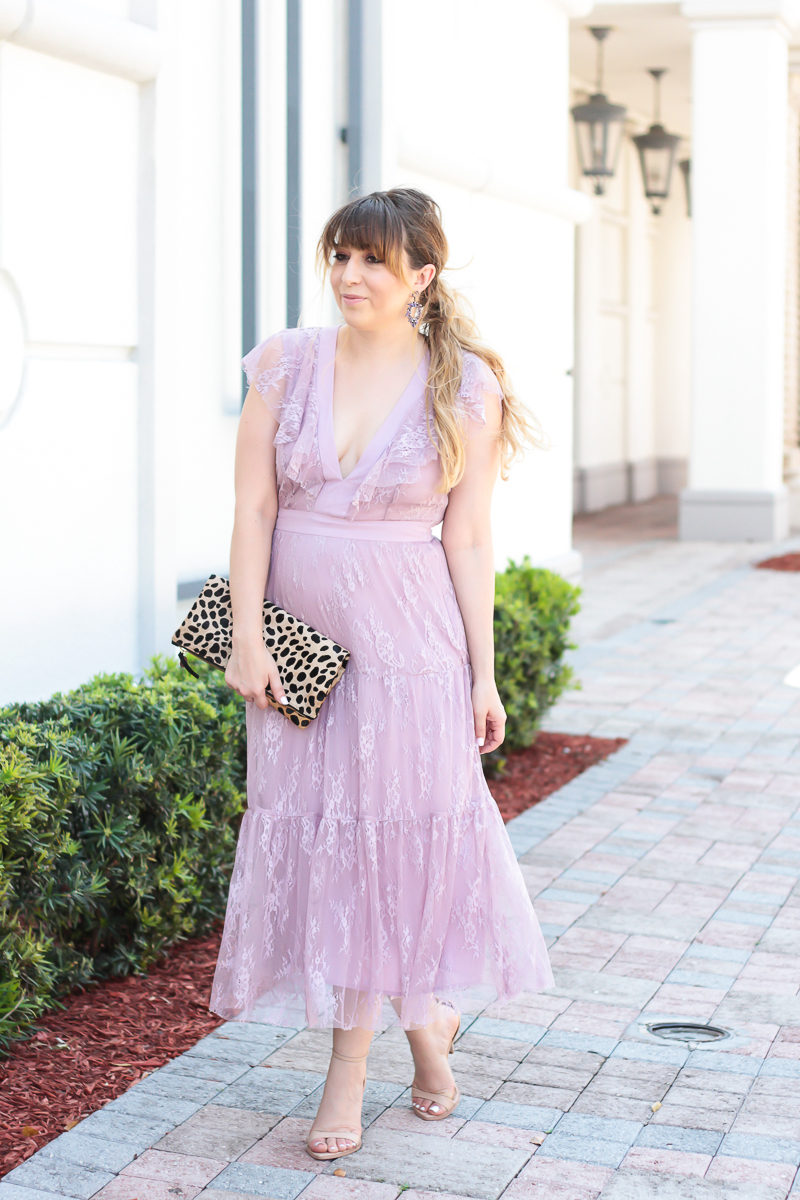 Miami fashion blogger Stephanie Pernas wearing a Wayf lace midi dress