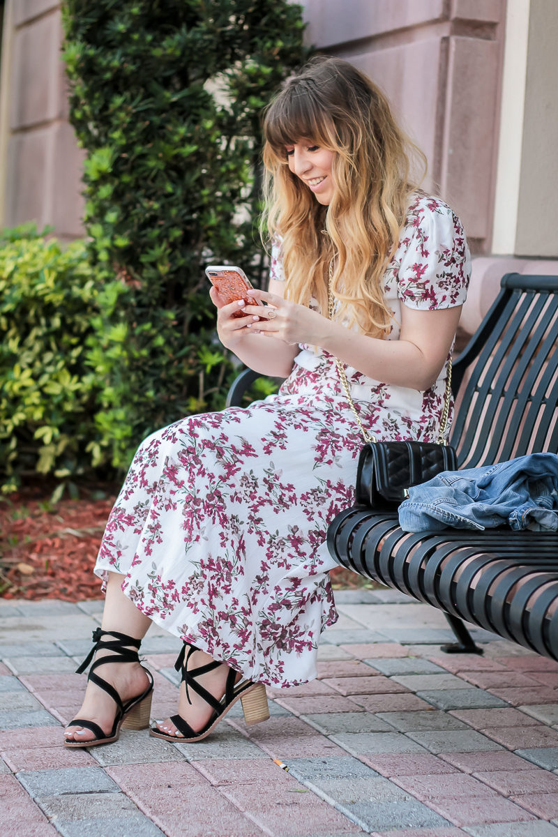 Miami fashion blogger Stephanie Pernas wearing a Wayf blouson midi dress with a jean jacket