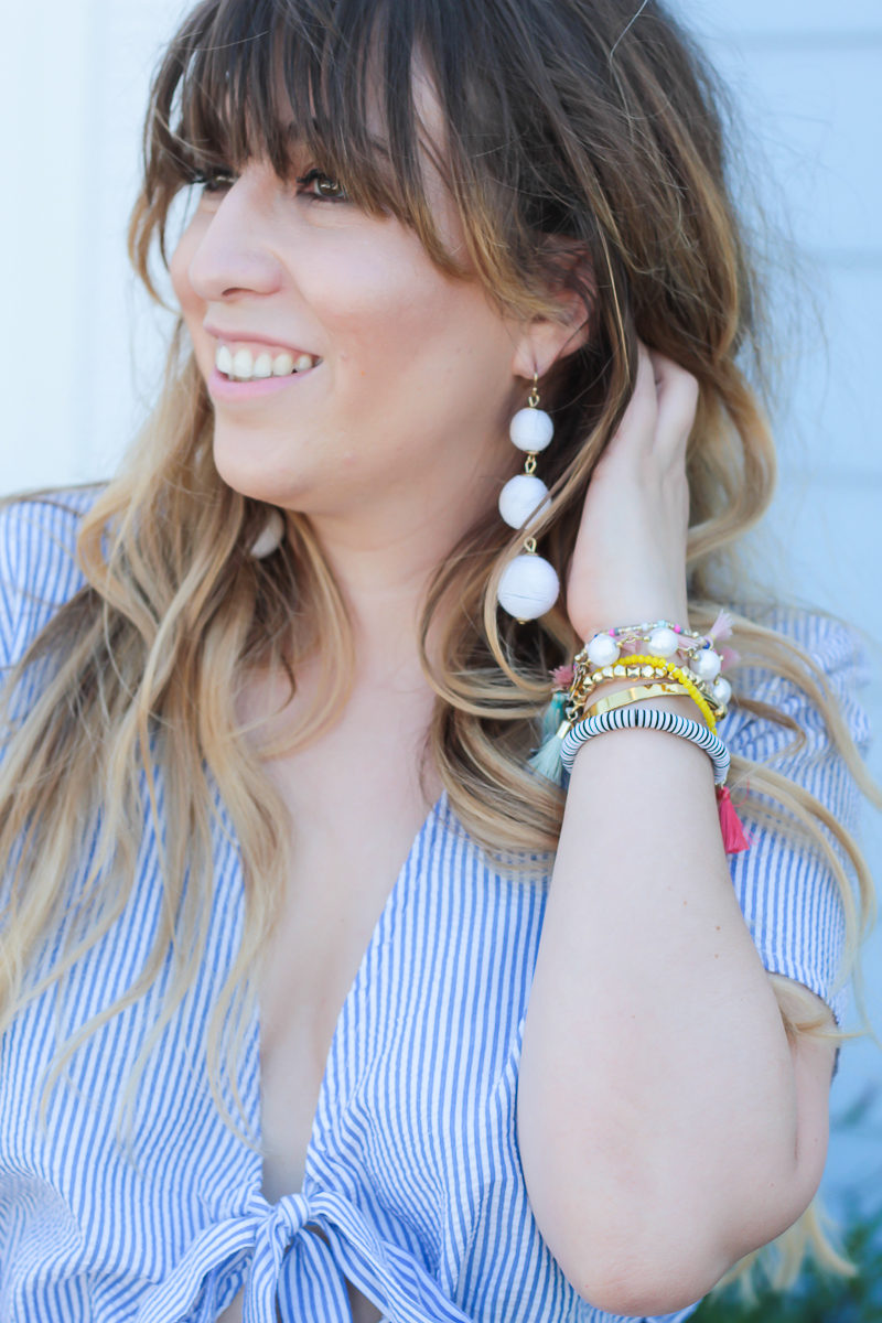 Miami fashion blogger Stephanie Pernas wearing Charming Charlie Austin earrings, similar to the Baublebar Crispin Drops