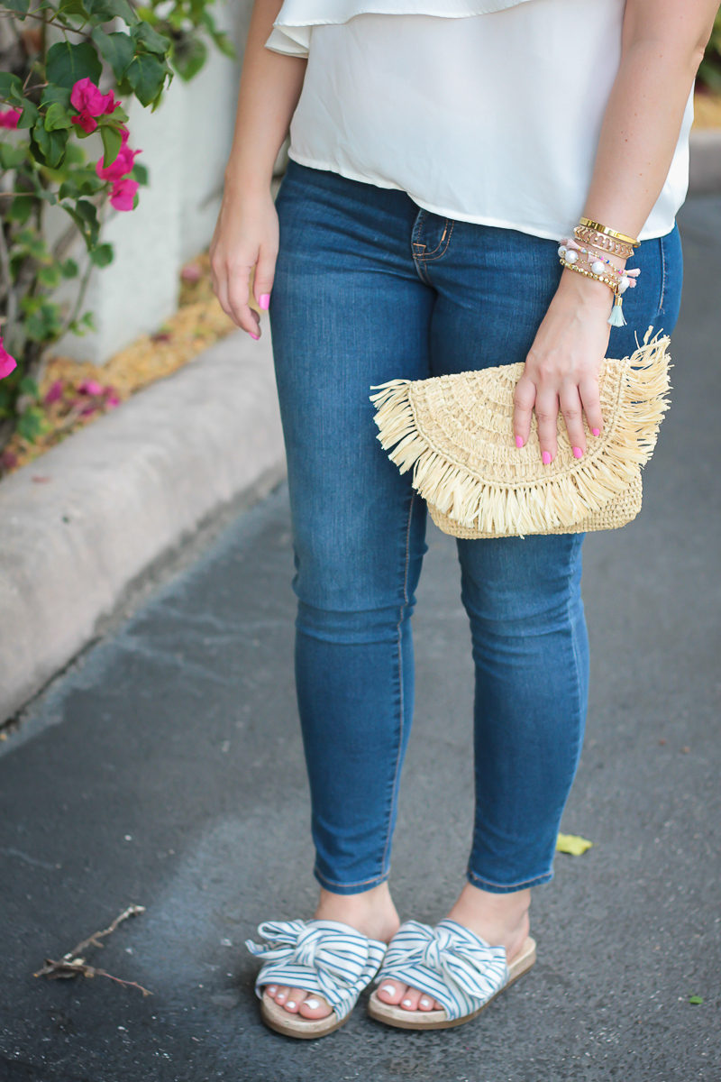 Miami fashion blogger Stephanie Pernas styles a Mar y Sol Mia clutch with Sam & Libby bow slides