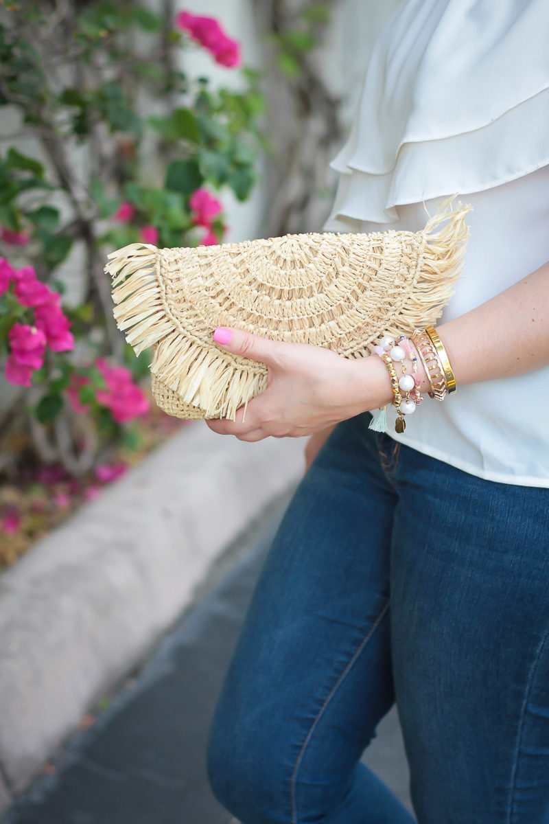 Miami fashion blogger Stephanie Pernas styles a Mar y Sol Mia clutch and a girly bracelet stack