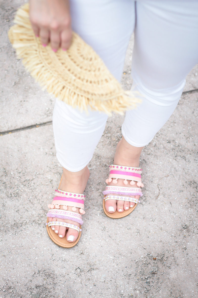 Miami fashion blogger Stephanie Pernas wearing pink pom pom sandals and white skinny jeans 