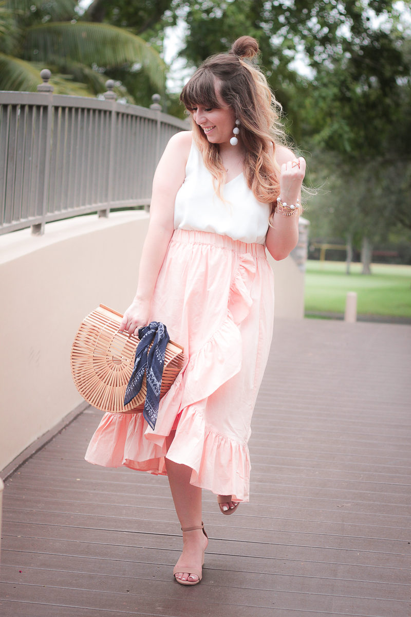  Fashion blogger Stephanie Pernas wearing an ASOS wrap midi skirt and cami with block heels for summer