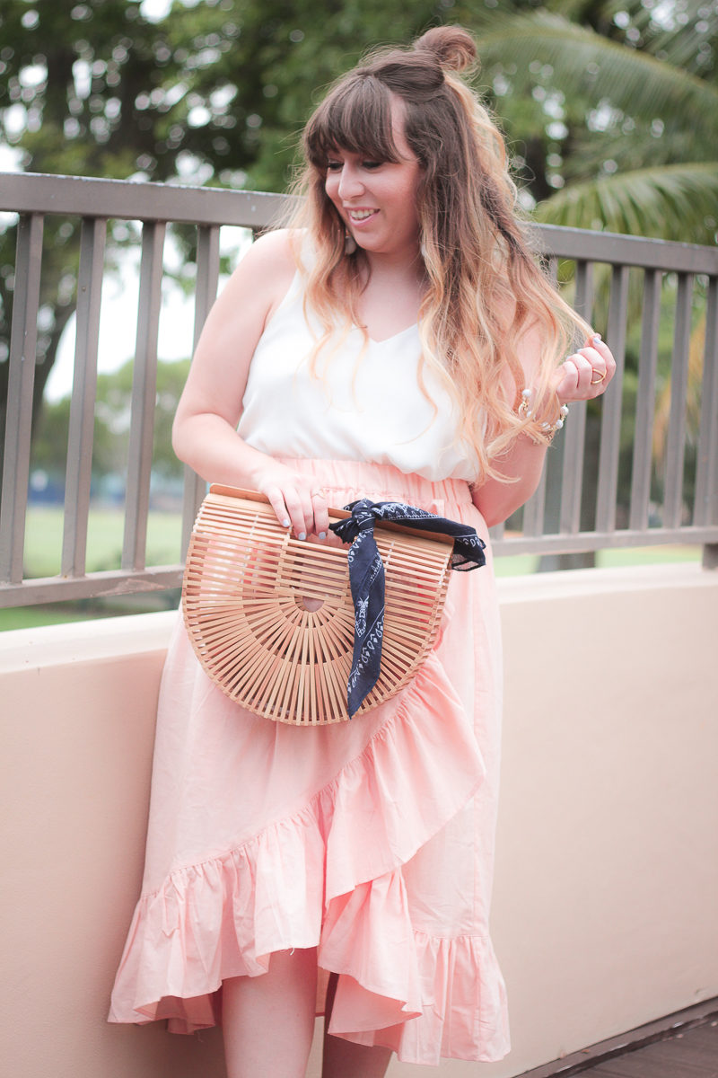  Miami fashion blogger Stephanie Pernas wearing a pink ruffle layered skirt for summer