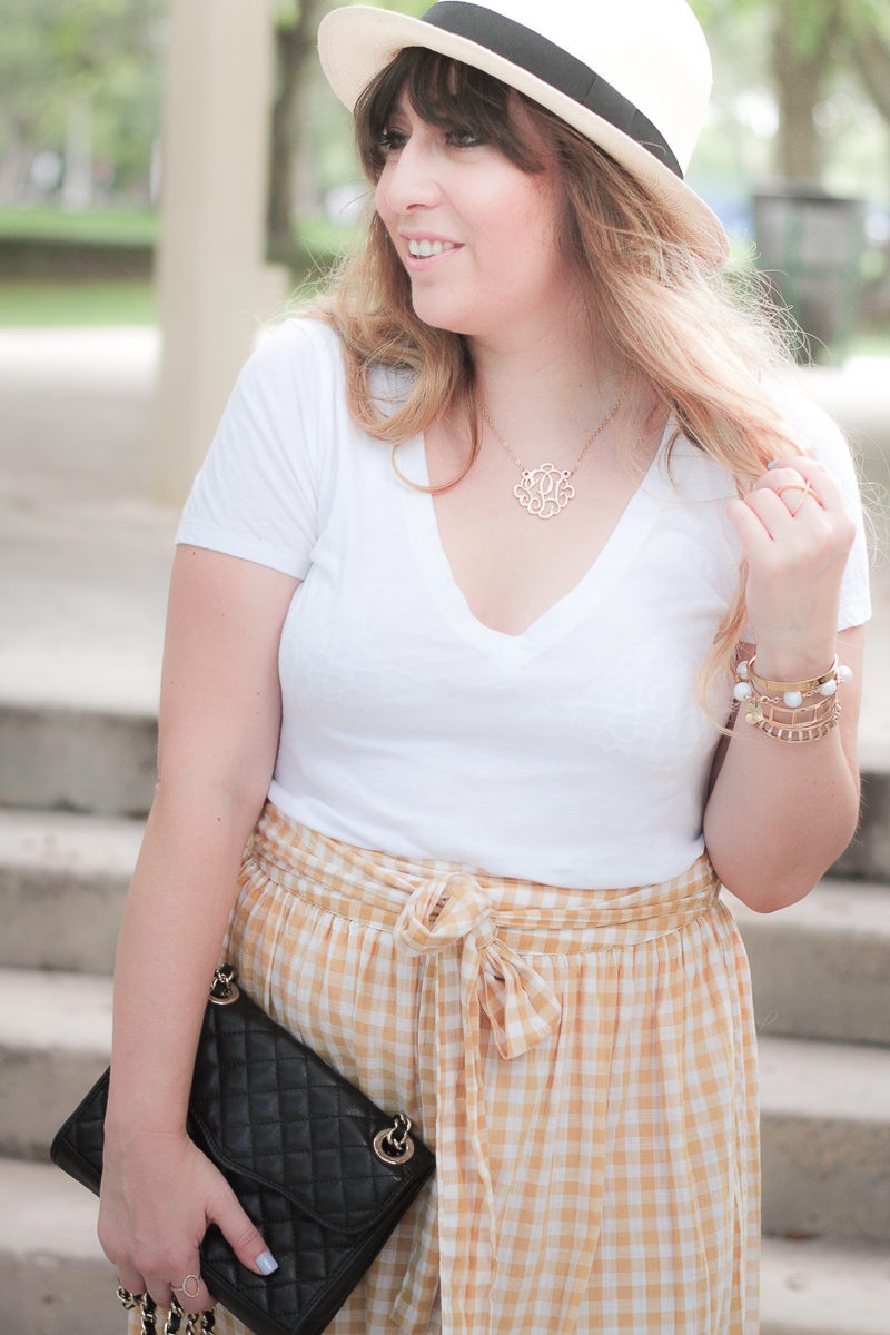 Miami fashion blogger Stephanie Pernas wearing a J.Crew Panama hat and ruffle gingham skirt