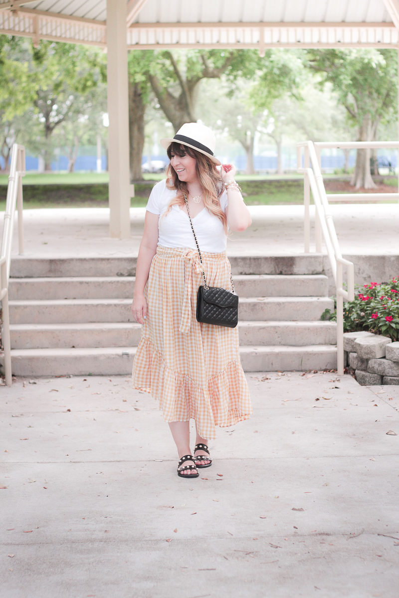 Miami fashion blogger Stephanie Pernas wearing an ASOS yellow gingham skirt