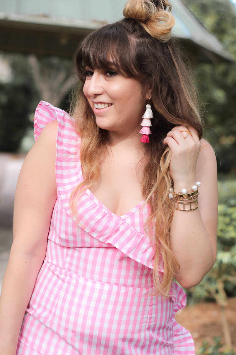 Miami fashion blogger Stephanie Pernas wearing a Boohoo pink gingham dress and Baublebar ombre tassel earrings