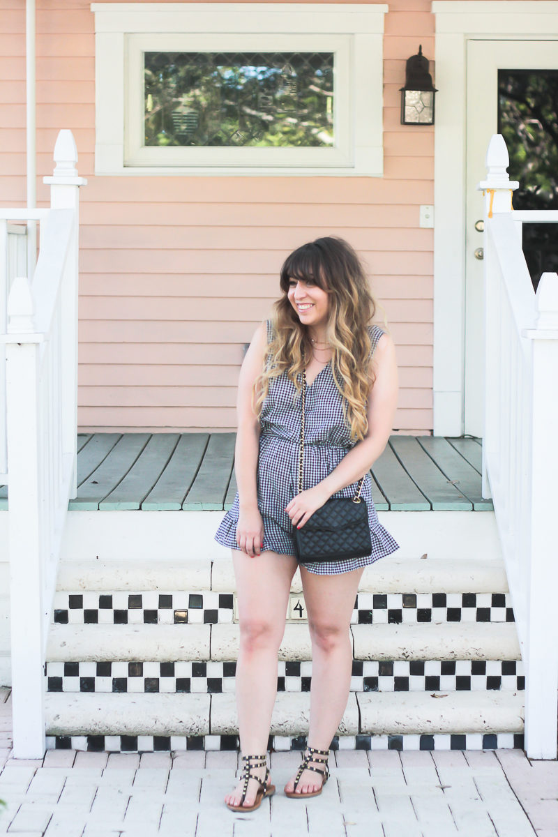 Miami fashion blogger Stephanie Pernas wearing a gingham bow romper for summer