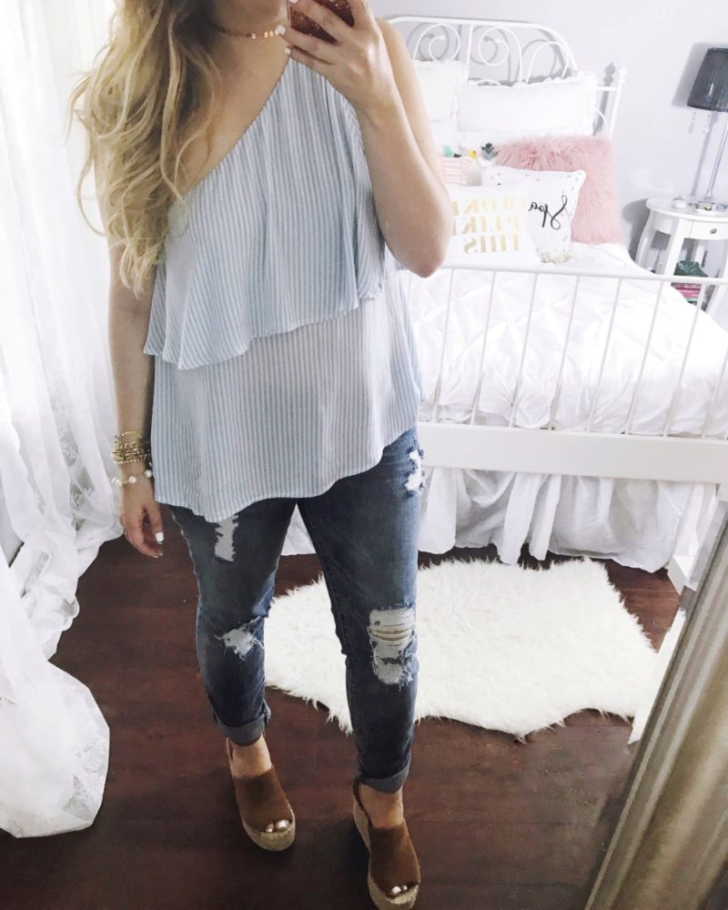 Miami fashion blogger Stephanie Pernas of A Sparkle Factor wearing a stripe one shoulder top and jeans