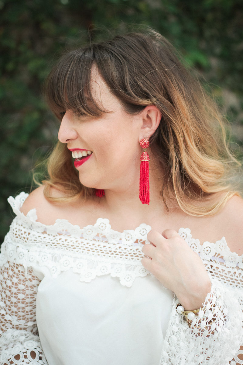 Miami fashion blogger Stephanie Pernas wearing red tassel earrings