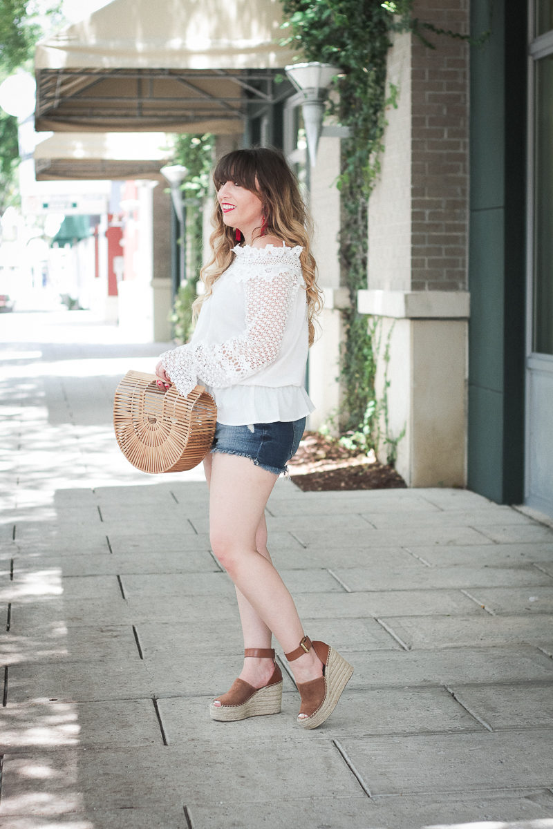 Miami fashion blogger Stephanie Pernas styles a jean shorts outfit idea for summer