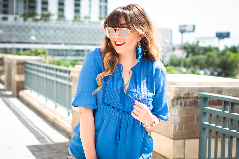 Fashion blogger Stephanie Pernas wearing Baublebar Rosalita Tassel earrings