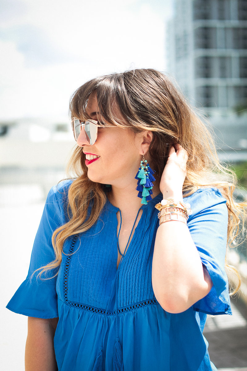 Miami fashion blogger Stephanie Pernas wearing Baublebar Rosalita Tassel earrings